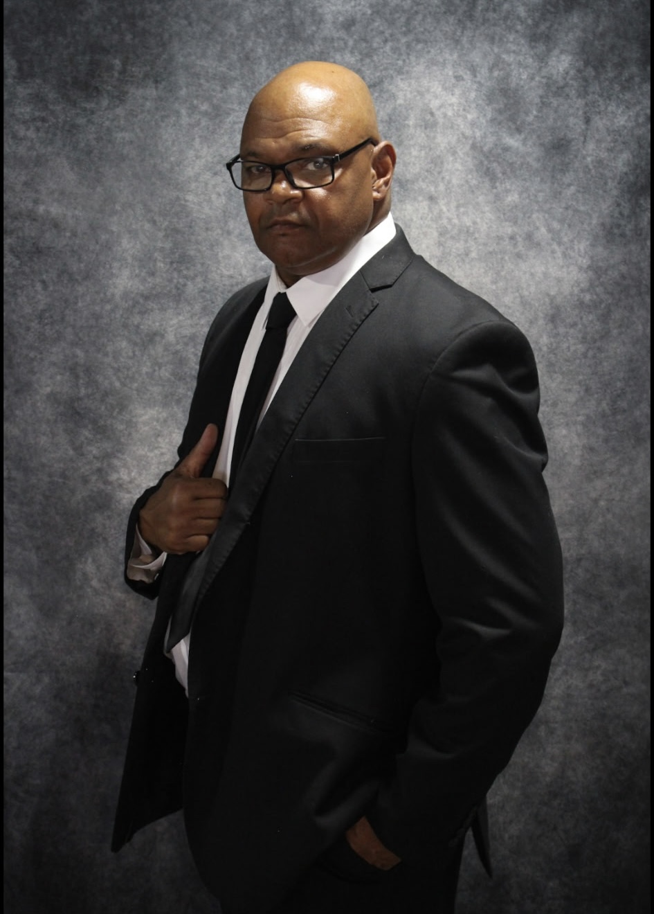 Tracy Britt in a suit, executive protection